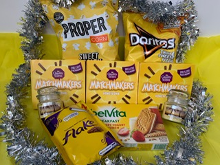 Lot 25. Yellow Midnight Snack & Candles Hamper